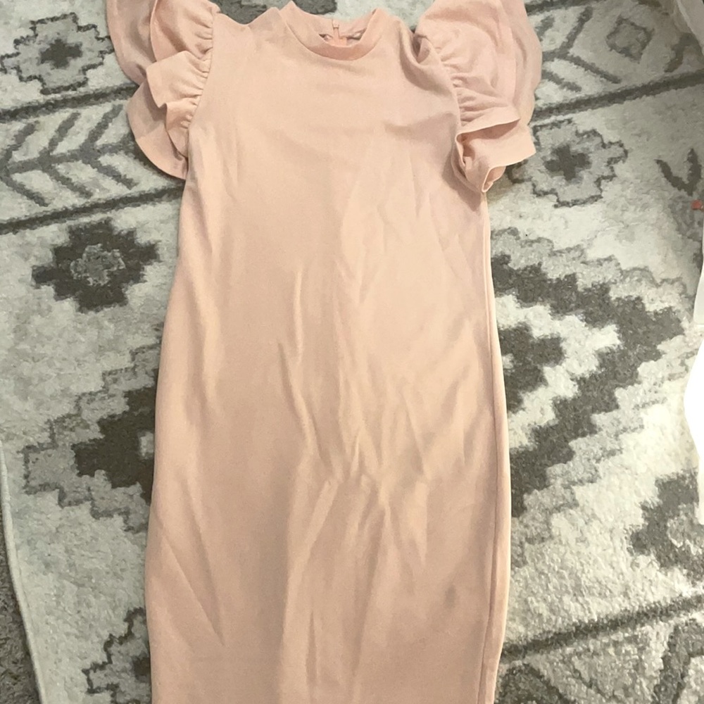 Pink form fitting ruffle dress
